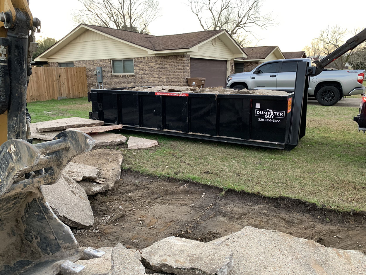 Broken concrete loaded level with the container's maximum loading line
