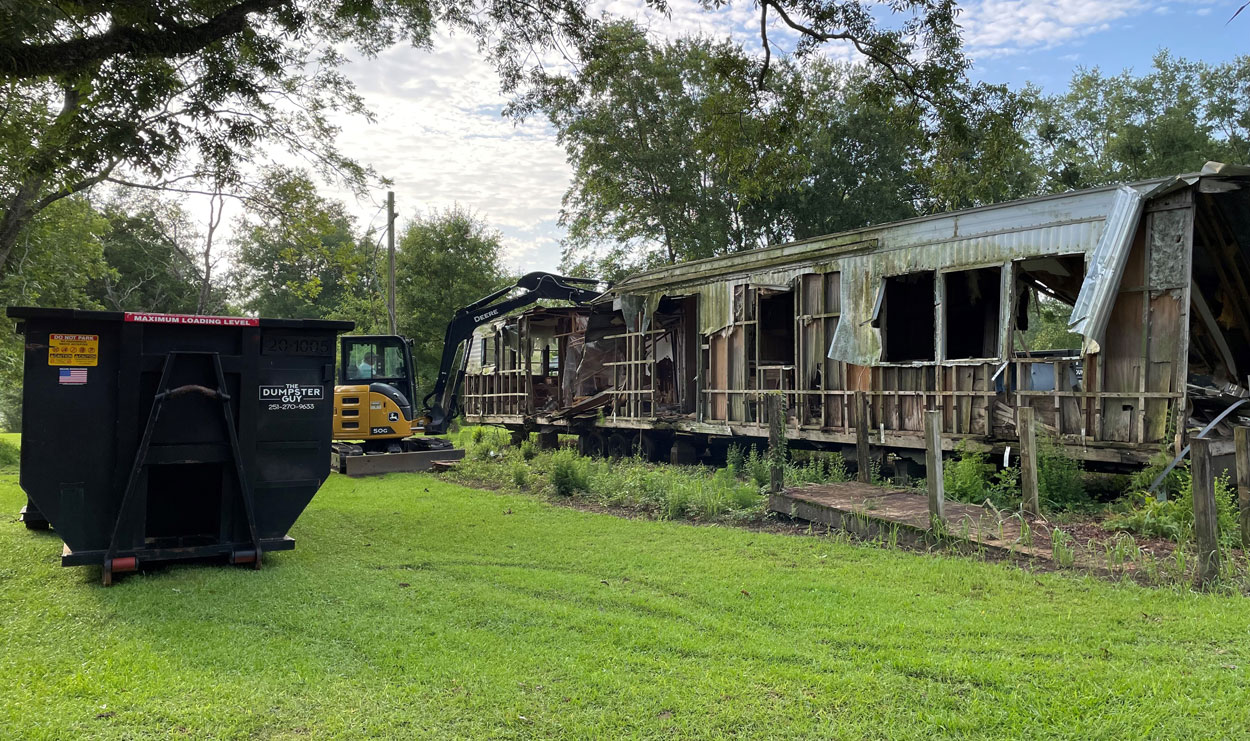 A single-wide being taken apart and loaded, Mobile County AL